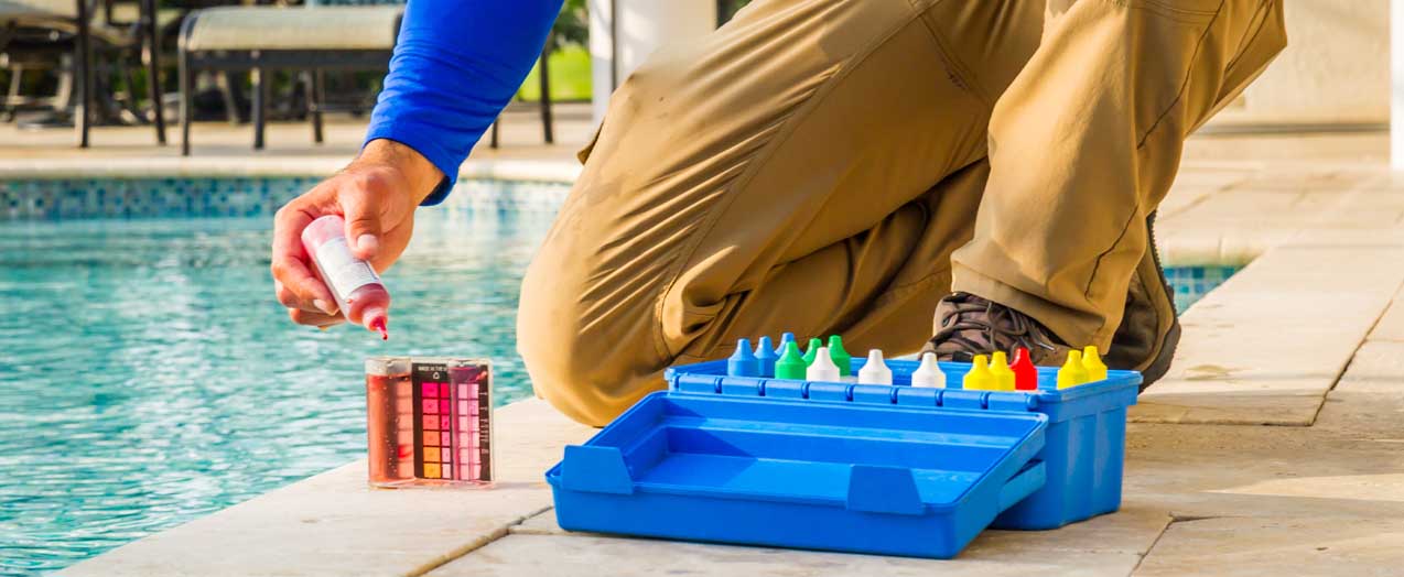 Pool Technician Performing a Water Quality Test | Edgewater Pools and Spa Services - Naples, Bonita Springs, Isles of Capri, & Estero